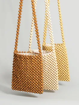 Egyetlen váll kors táska, női nyári niche tervezés, fa gyöngy táska, ingázás kézzel szőtt táska vip luxus designer